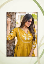 Mustard Yellow Embroidered Peplum Kurta Set with Palazzo